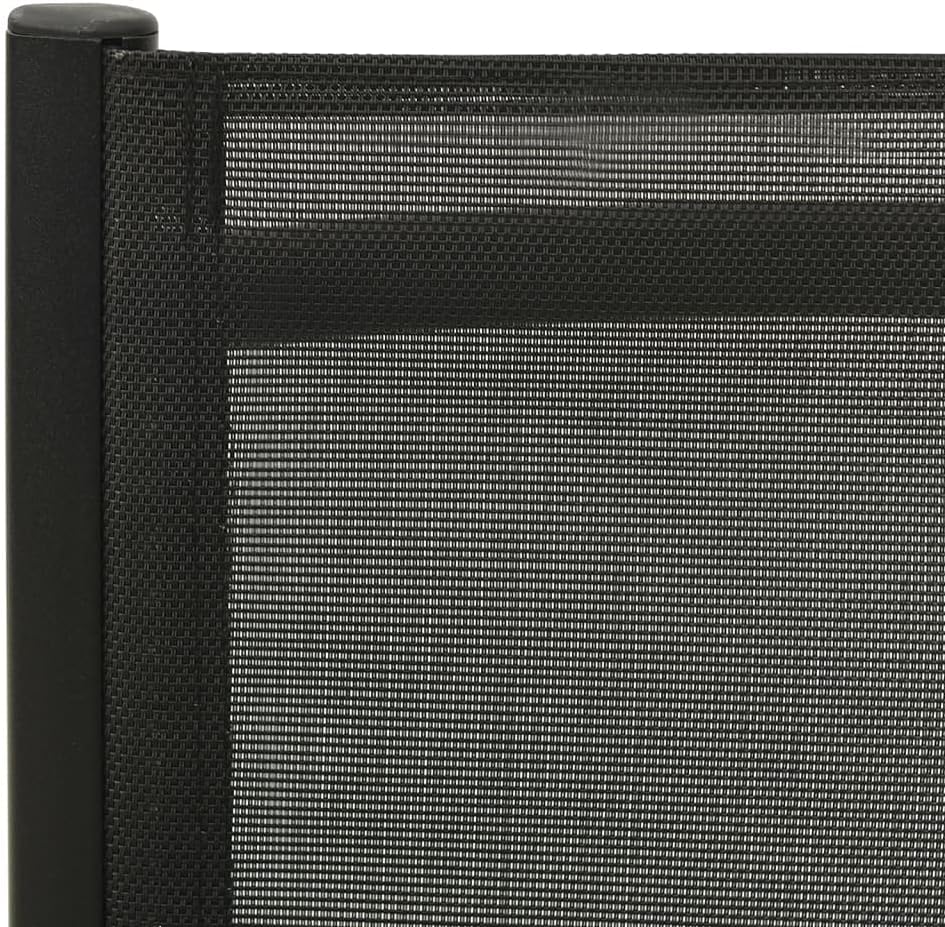 A închide view of the black textilene fabric on the garden chair, showing its breathable texture.