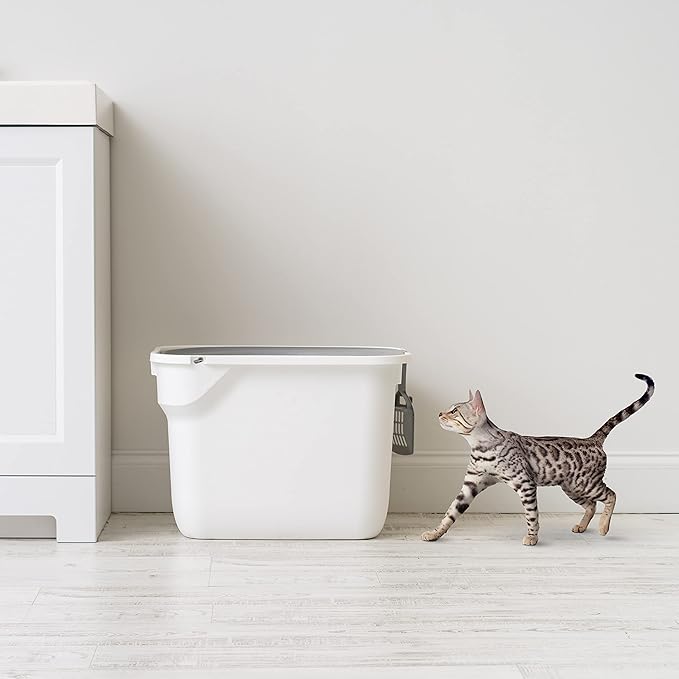 Overall, the IRIS USA Rectangular Top Entry Cat Litter Box is a practical and stylish solution for cat owners looking to provide their feline friends with a comfortable and private place to do their business. Its innovative design helps to reduce tracking, prevent dogs from accessing the litter, and maintain a clean and odor-free environment for both cats and their owners. Description by ChatGPT.