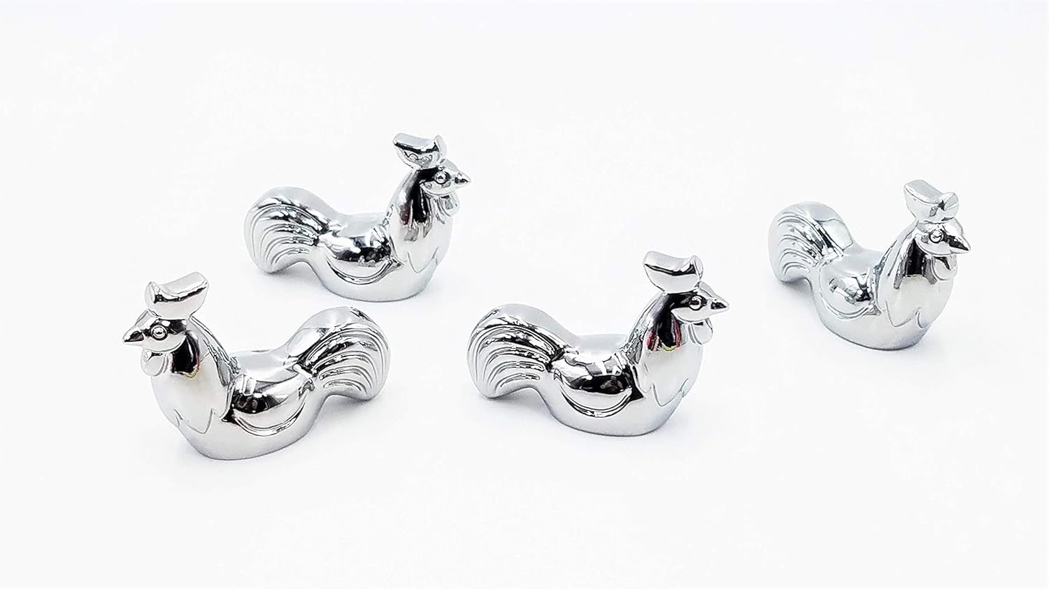 JJ Gifts Stainless steel chopstick and spoon rests shaped like animals of the Chinese Zodiac. Comes as a set of 4 tableware rests. (Rooster)