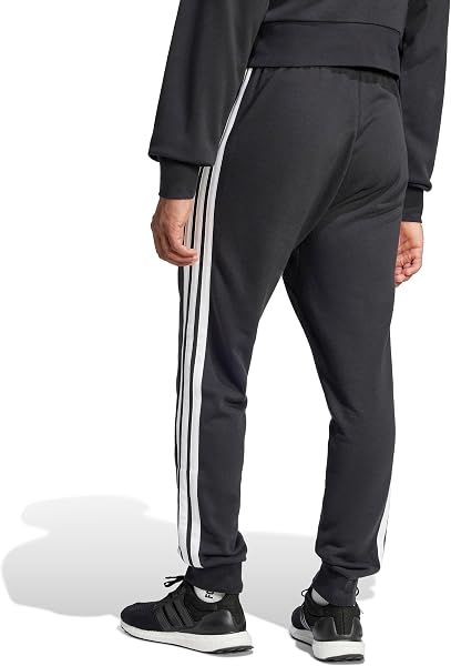 Visita lo Store di adidas adidas - Essential Three Stripes French Terry Pant, Pantaloni da Golf Uomo in use