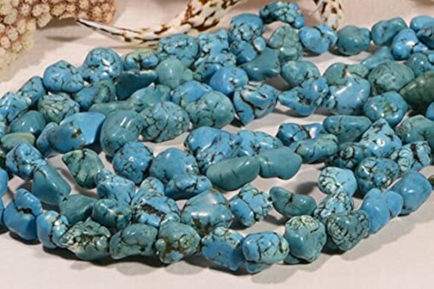 Perles magnésite LKBEADS 10-15mm pour créer vos colliers bohèmes en vacances