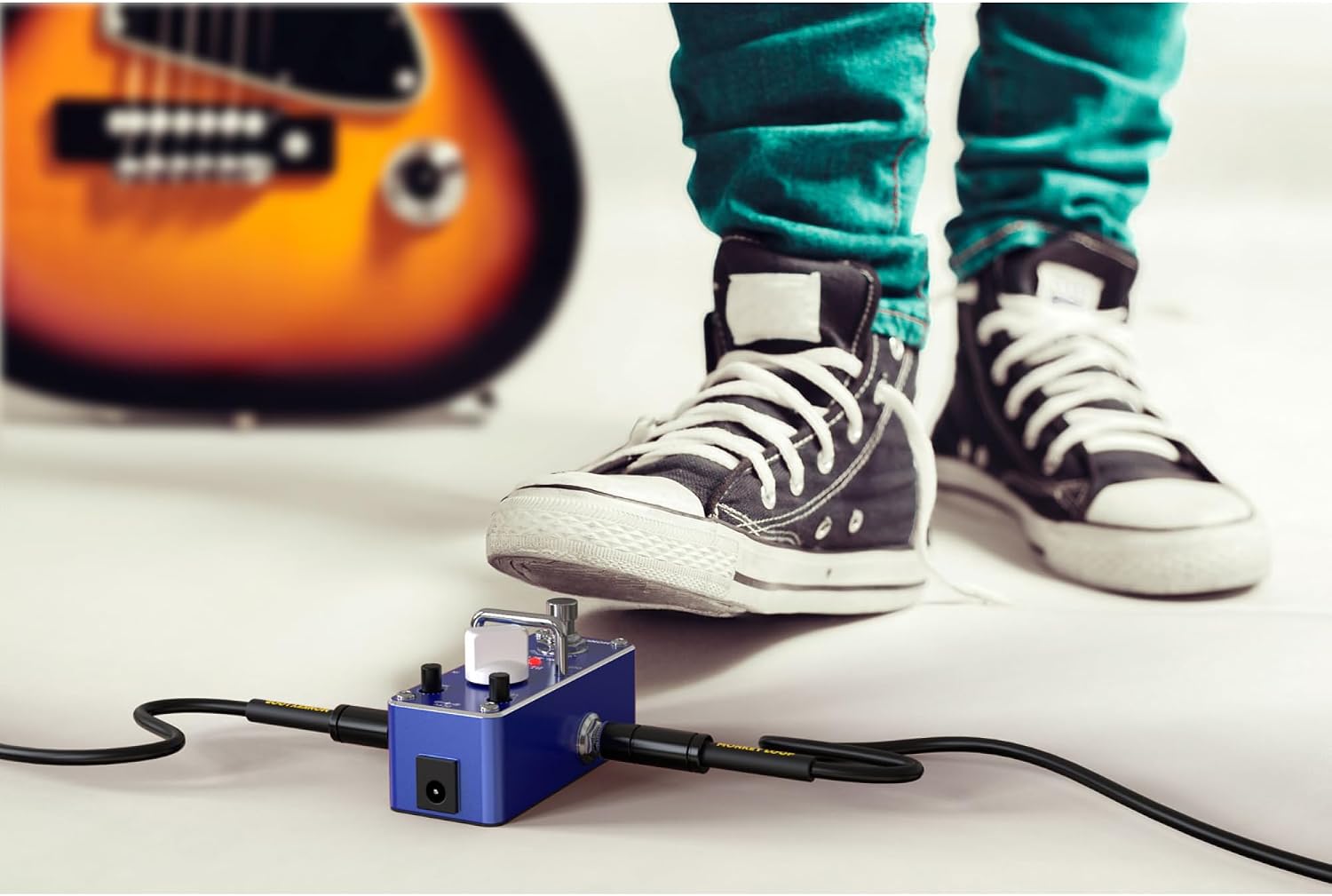 Monkey Loop ML-BL1 Blues Driver pedal connected to a guitar and amplifier, with a foot engaging the footswitch.