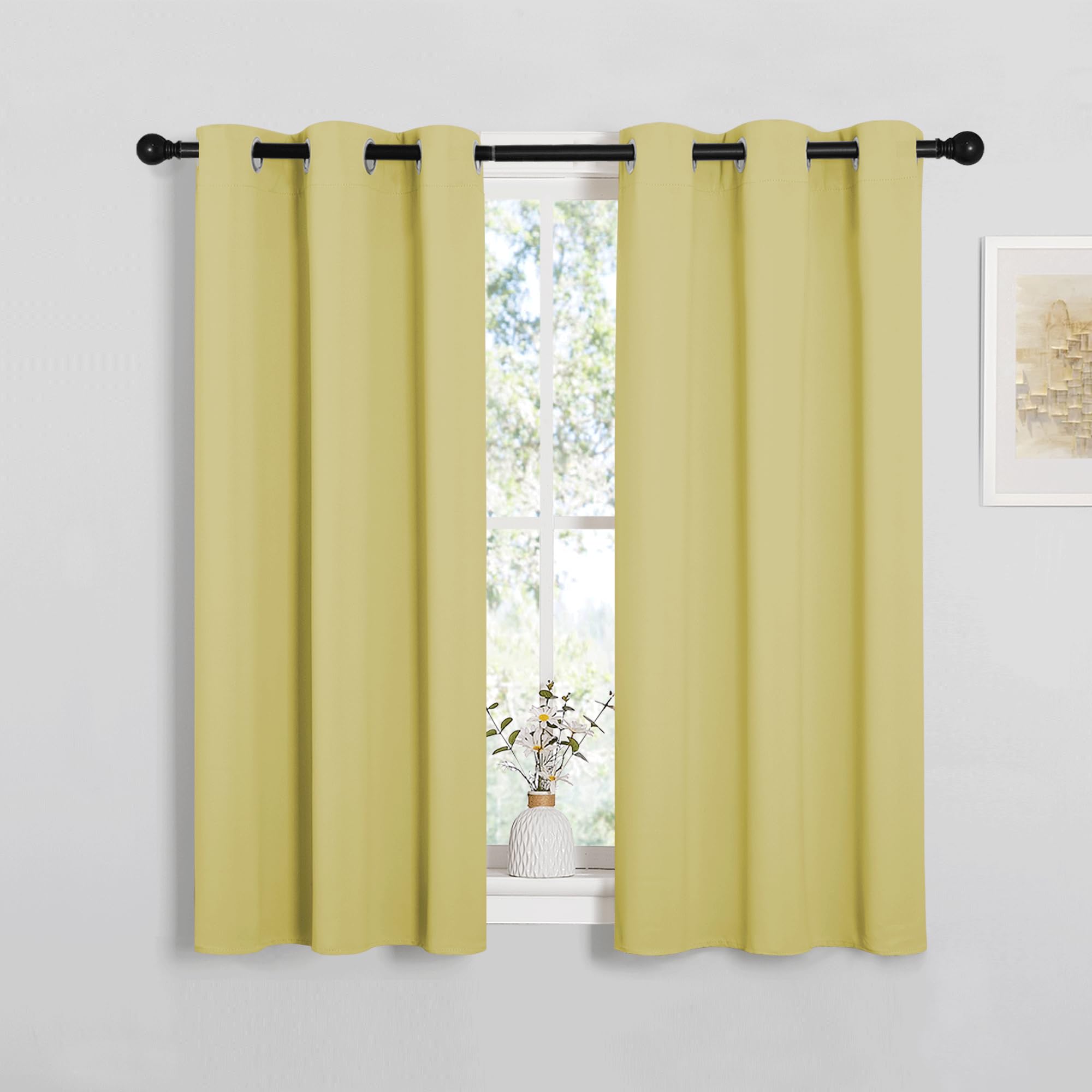 NICETOWN Bedroom Curtain Panels Blackout Draperies, Thermal Insulated Solid Grommet Blackout Curtains/Drapes (Paler Yellow, 1 Pair, 34 by 45-inch)