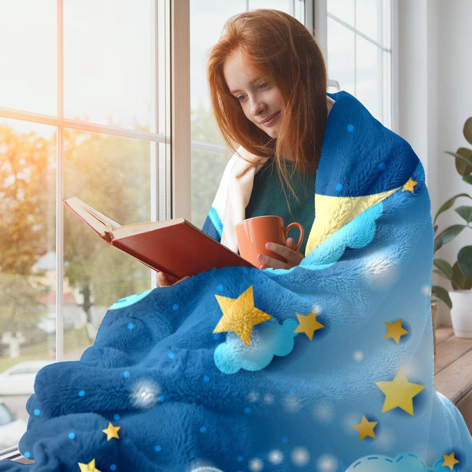 Manta de forro polar con diseño de estrellas y luna, color azul