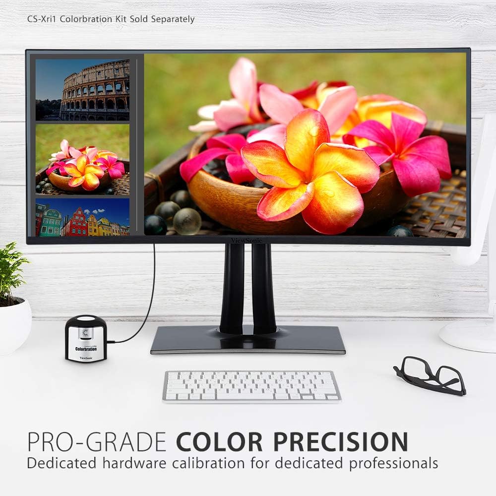 ViewSonic VP3481 monitor with a color calibration device on the desk, labeled 'PRO-GRADE COLOR PRECISION'.
