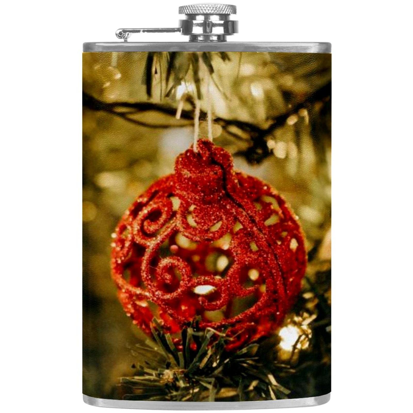 Flasque pour liqueur haut de gamme et ornements rouges sur le sapin de Noël