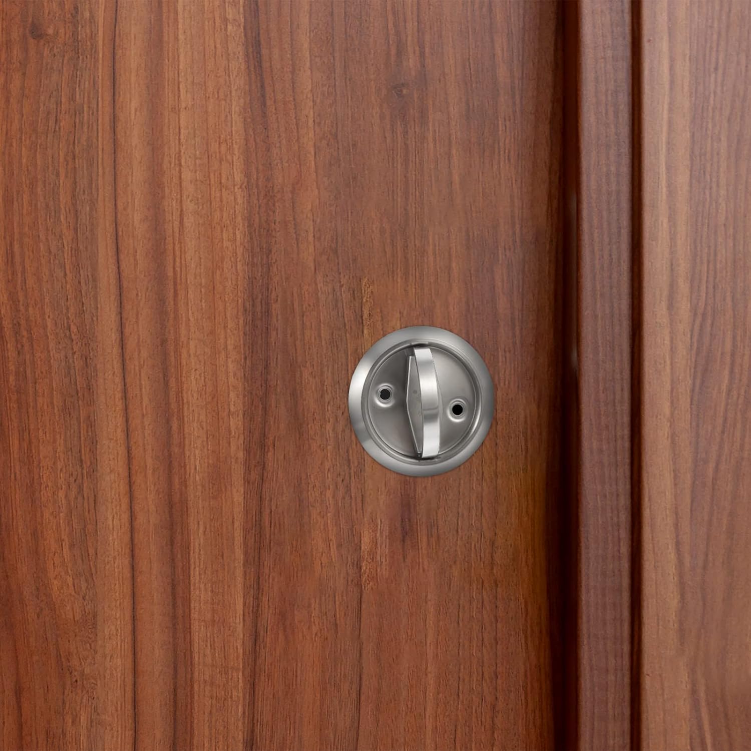 Image showing the DOITOOL Recessed Cup Lock installed flush on a wooden interior door, demonstrating its discreet and integrated appearance.