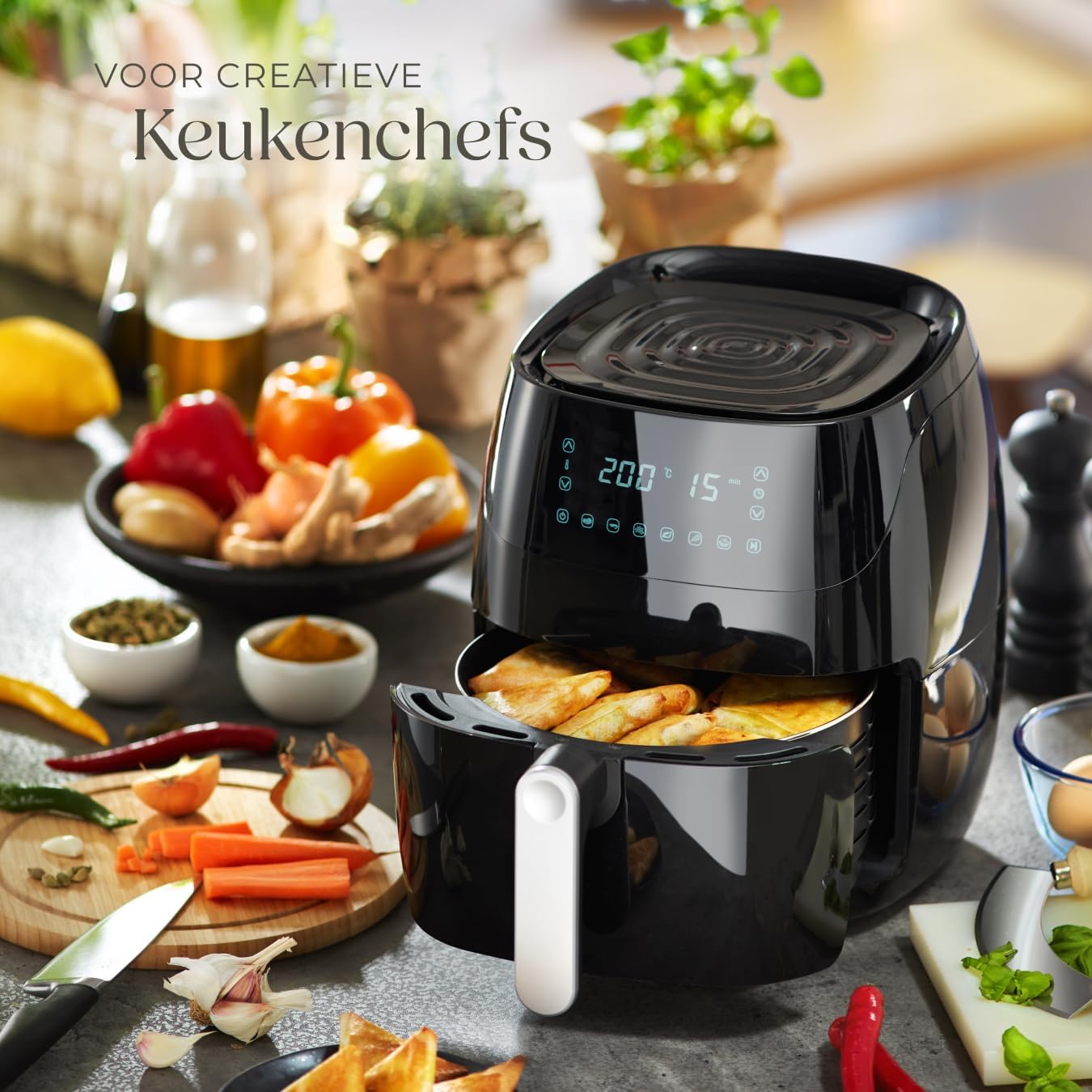 Airfryer with various cooked dishes