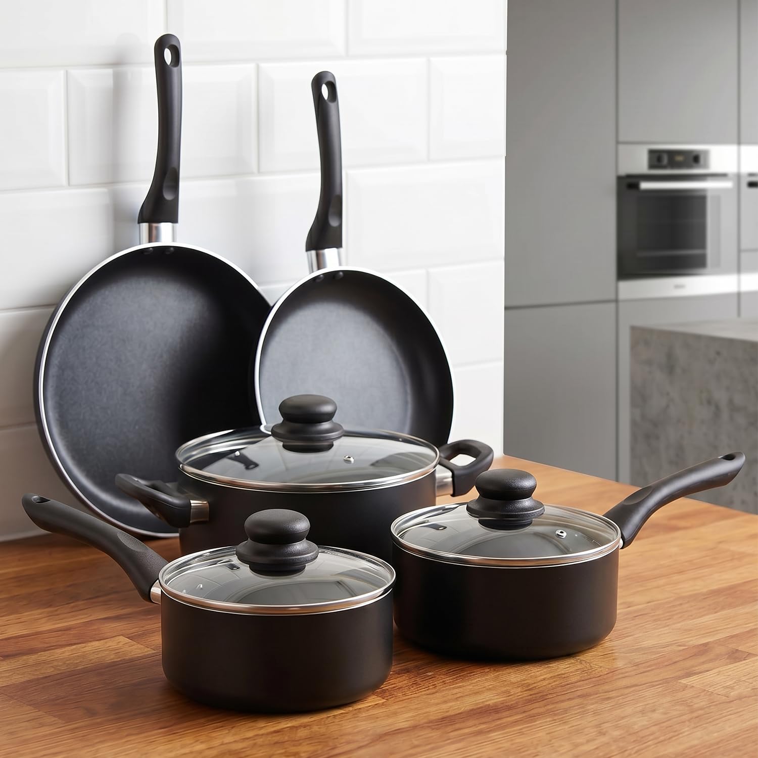 Bateria de Cocina de 8 Piezas. Juego de Ollas y Sartenes Completo: 2 Sartén 2 Cazo 1 Cacerola 3 Tapas de Cristal. Aluminio con Mangos de Baquelita, Incluye Set de 5 Cuchillos