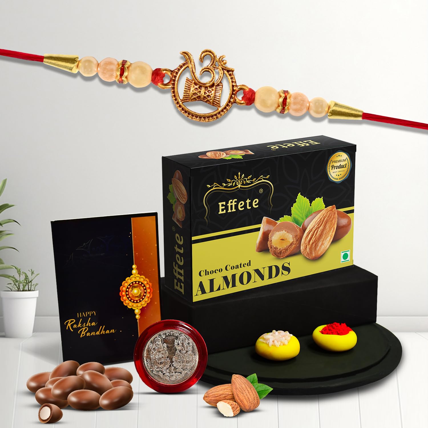 DeoDap Designer Om Damru Rakhi for Brother with Choco Coated Almonds Chocolate 32gm, Pooja Coin, Roli Chawal & Card | Rakhi with Chocolate Combo for Raksha Bandhan at ₹51 (87% Off) – Amazon