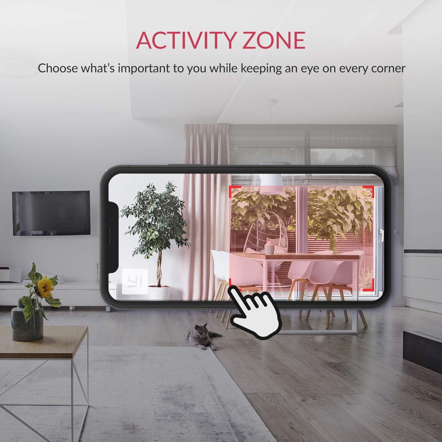 A smartphone screen displaying the camera's view of a living room, with a red rectangular box highlighting an 'Activity Zone'.
