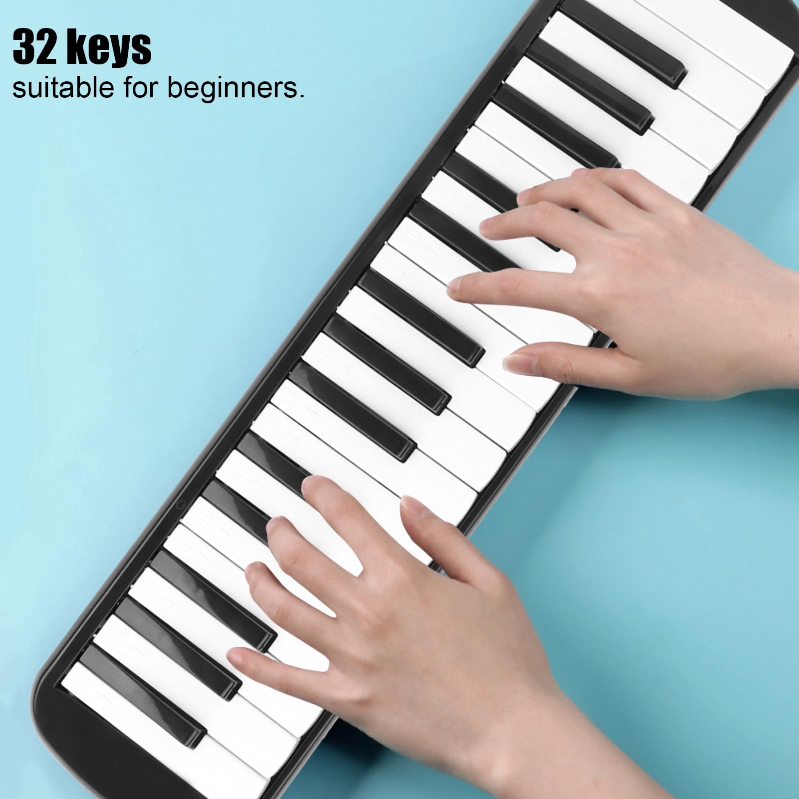 32 Clés Mélodica ABS IRIN Mélodica adapté pour Débutant Pratique Sac à Vent Instrument de Musique Clavier Harmonica Noir (Noir)