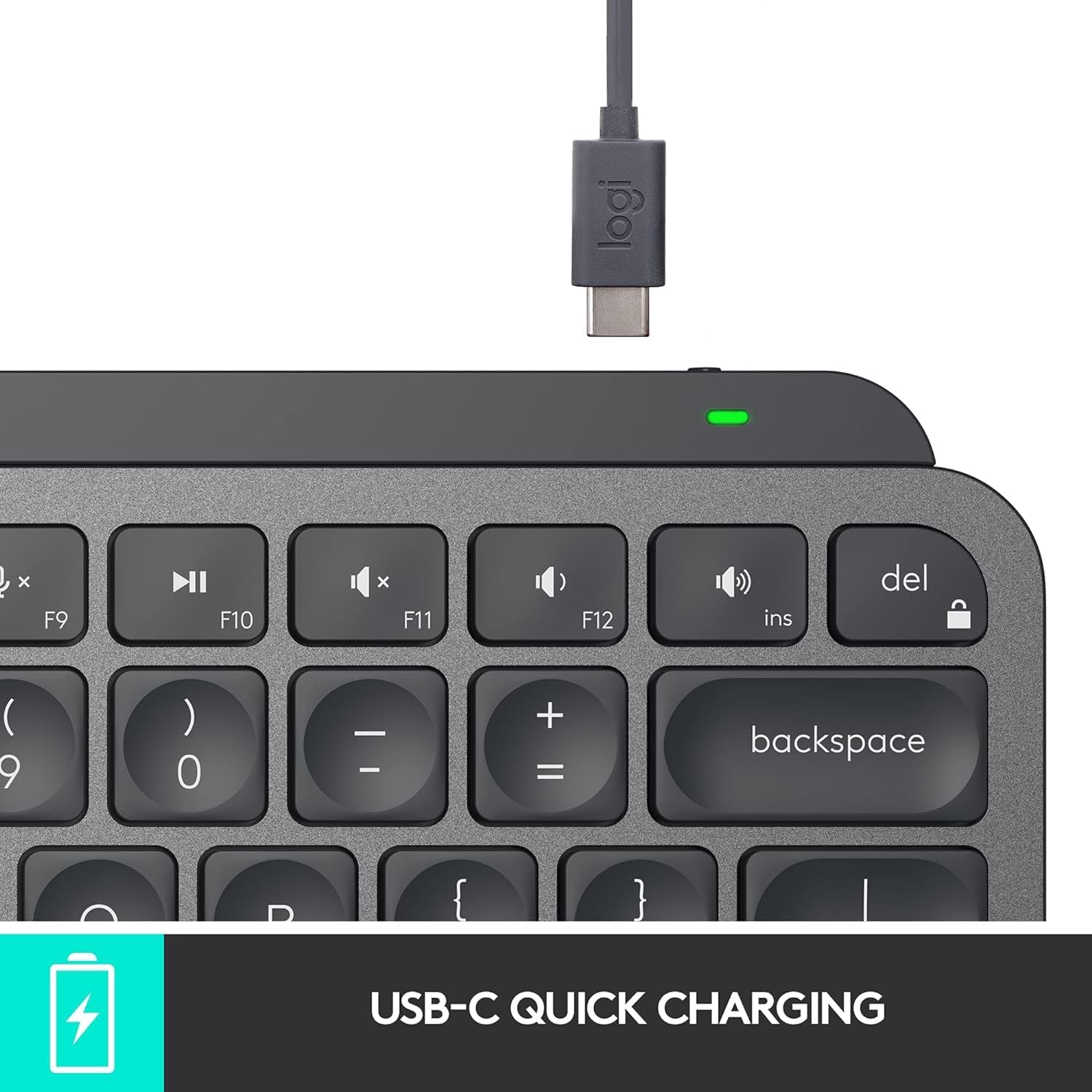 Logitech MX Keys Mini keyboard connected to a USB-C charging cable