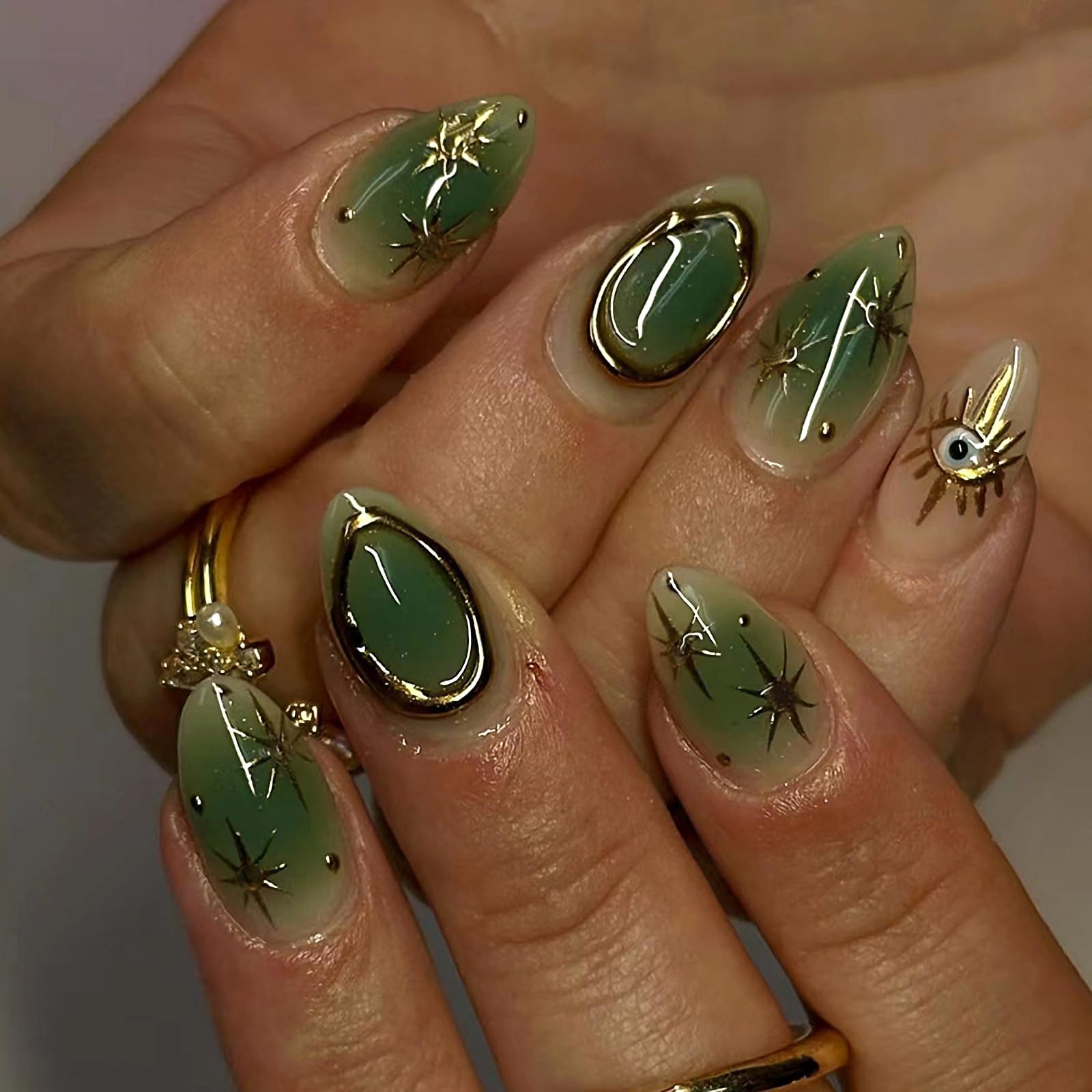 MERVF Almond Press on Nails Medium Fake Nails Green Gradient Glue ons Gold Sun Star Stiletto Acrylic Nail with Aura Design 30pcs Glossy