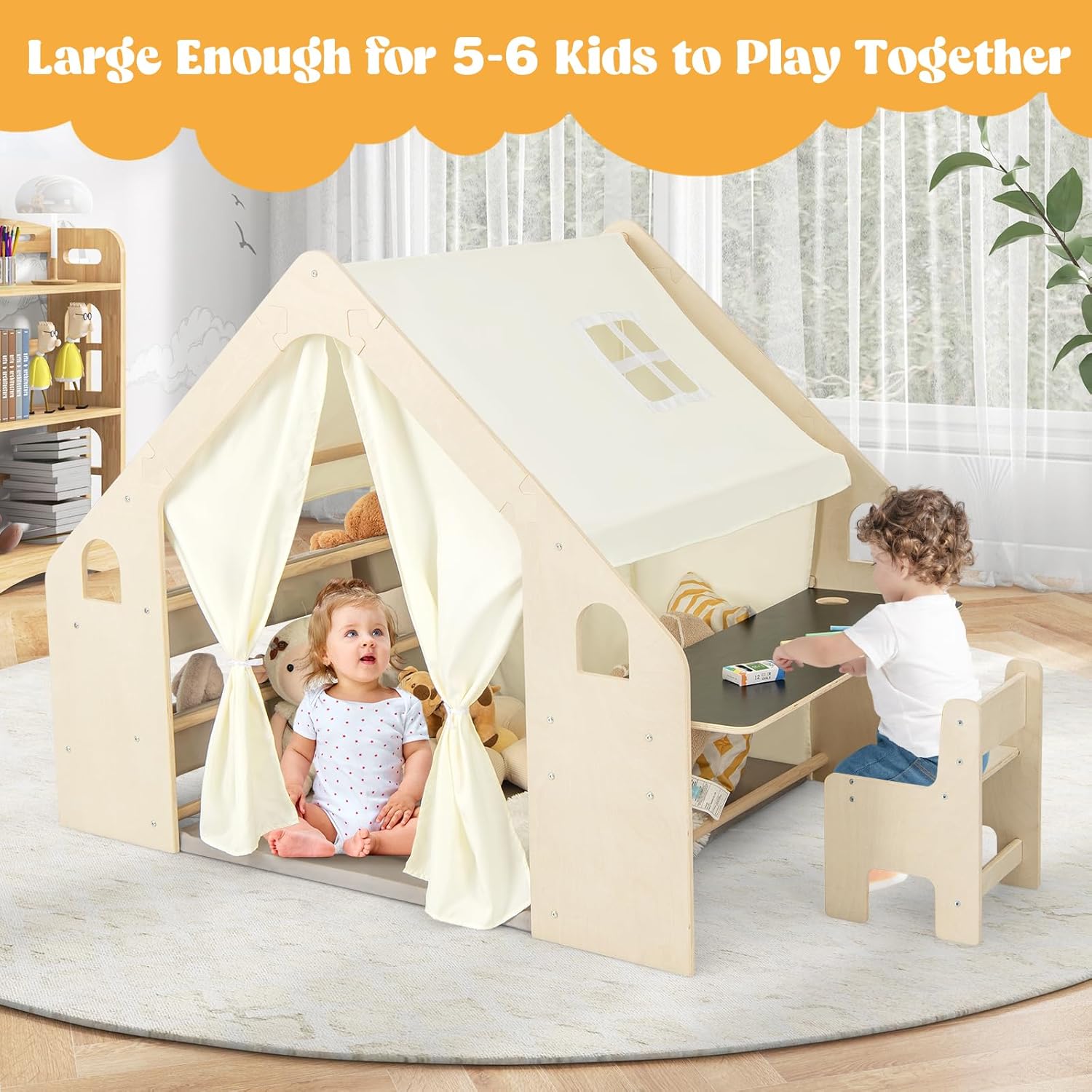 Children playing inside the large playhouse tent