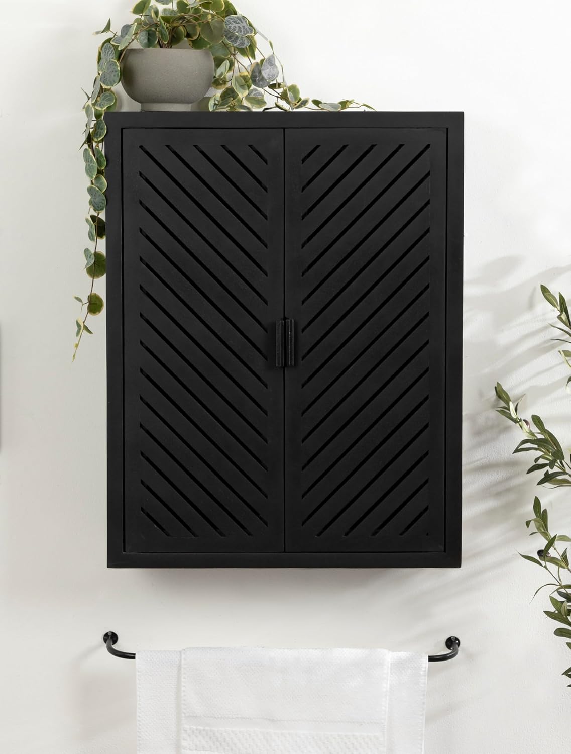Kate and Laurel Mezzeta Decorative Modern Two-Door Floating Bathroom Cabinet, 22 x 7 x 28, Black, Decorative Over Toilet Storage Cabinet Made from Solid Mango Wood with Slatted Chevron Design