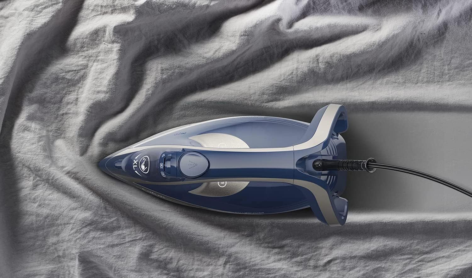 Tefal Smart Protect Plus FV6872 Steam Iron resting on its heel