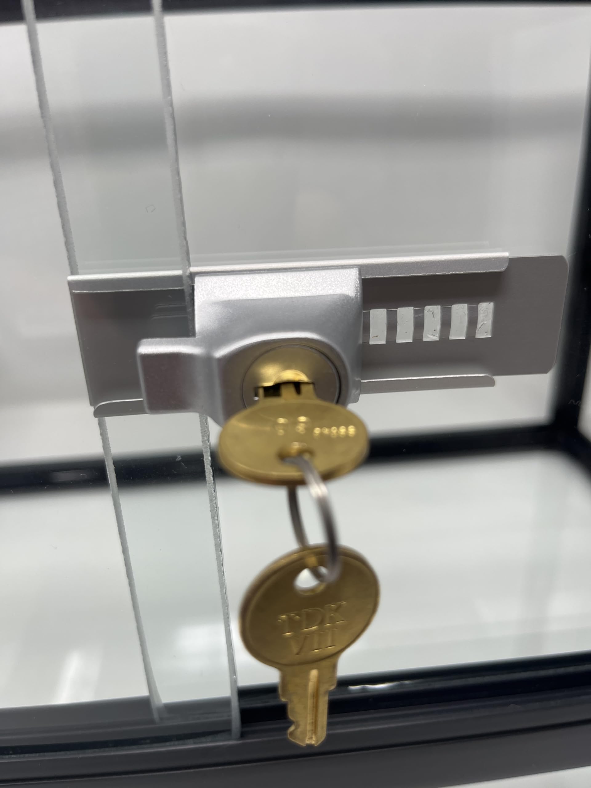 TDK-7 Stick-On Showcase Lock