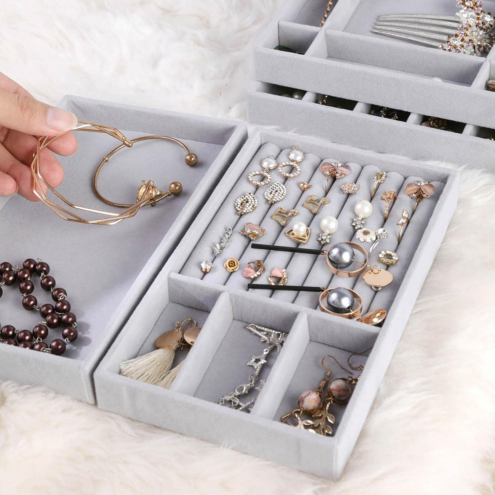 Stalen grijze sieraden display lade met grijs gevlokt compartiment