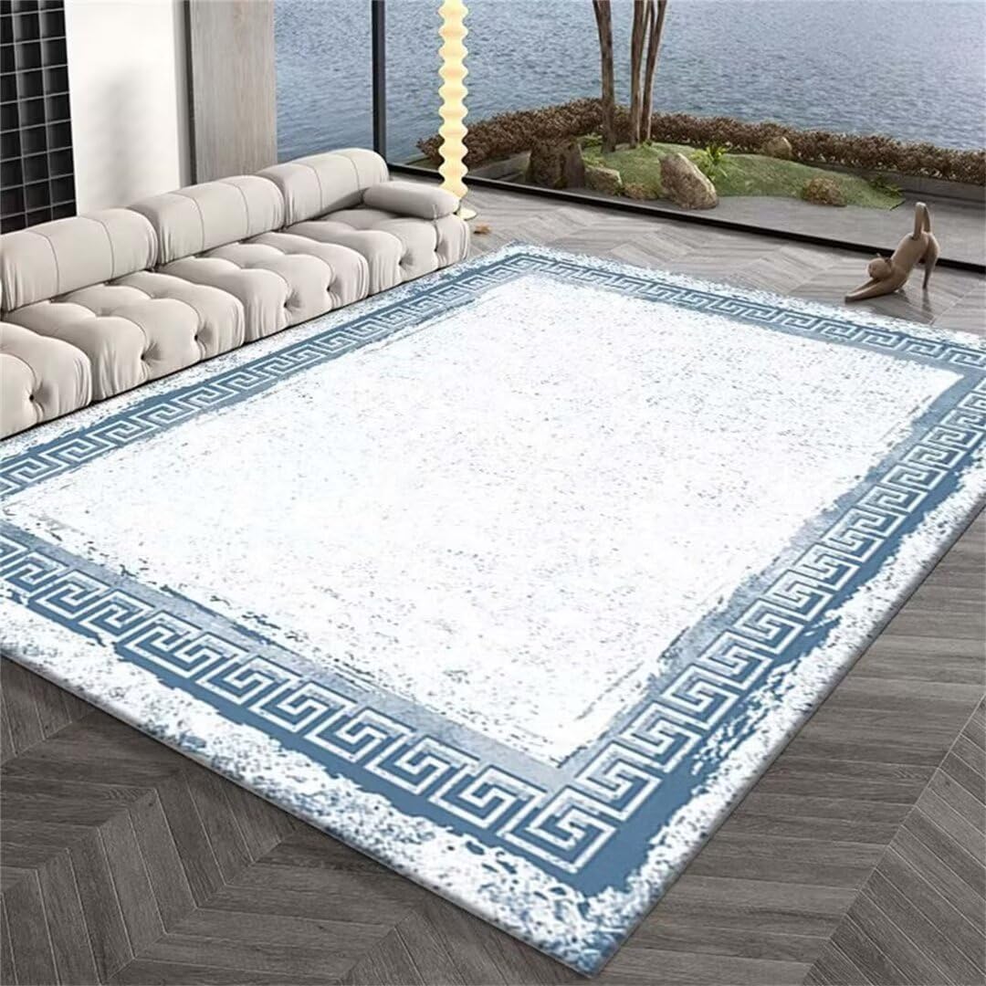 Tapis de salon bleu 60x90cm au design epure moderne et finitions soignees
