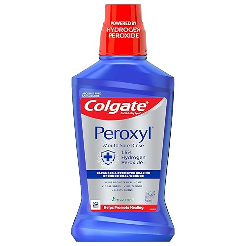 Colgate Peroxyl Mouth Sore Rinse menta suave169 onzas