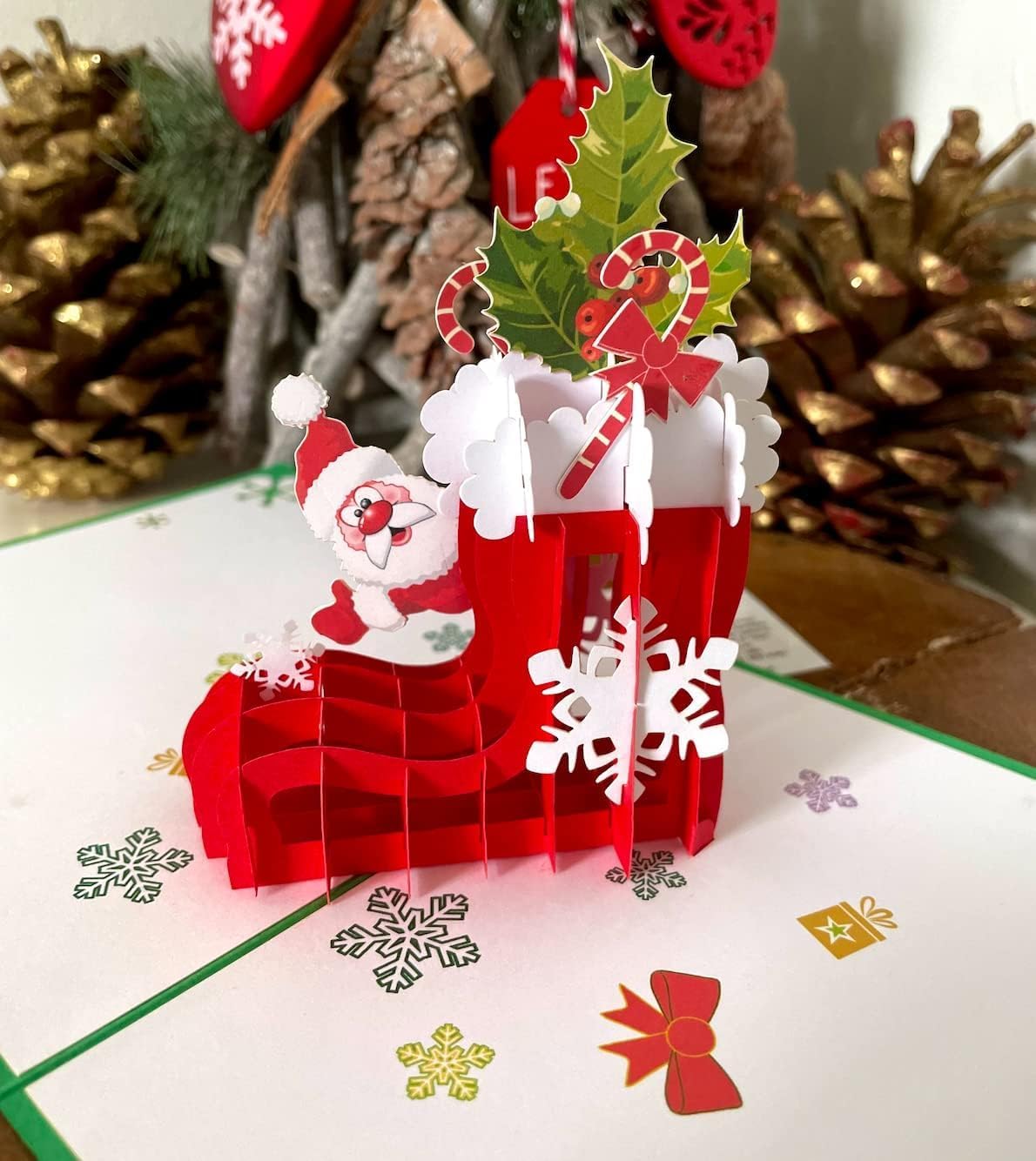 Santa Claus Red Gift Stocking 3D Pop Up card.A Delightful holiday surprise greeting card gift for kids, friends, family and loved ones. For Christmas decor and parties.15cmx15cm