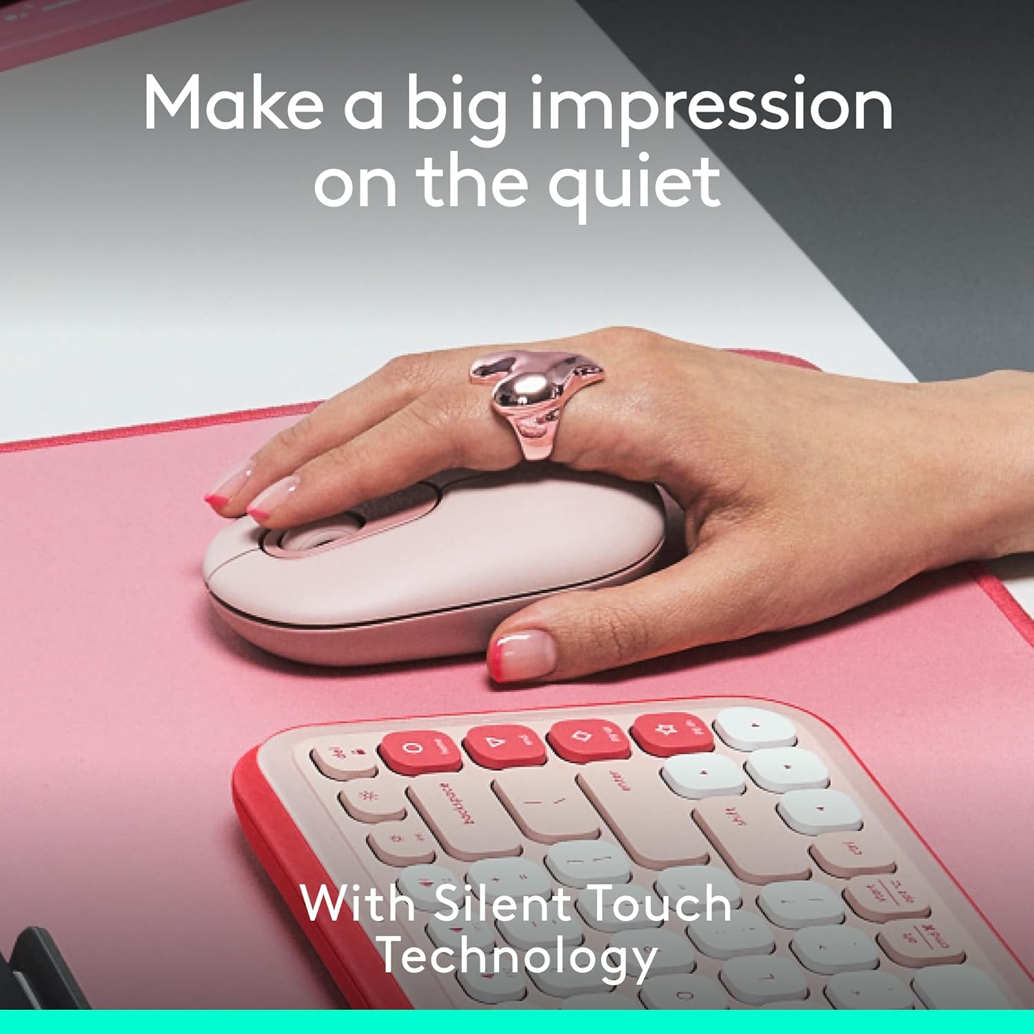 Hand using Logitech POP Mouse with quiet clicks