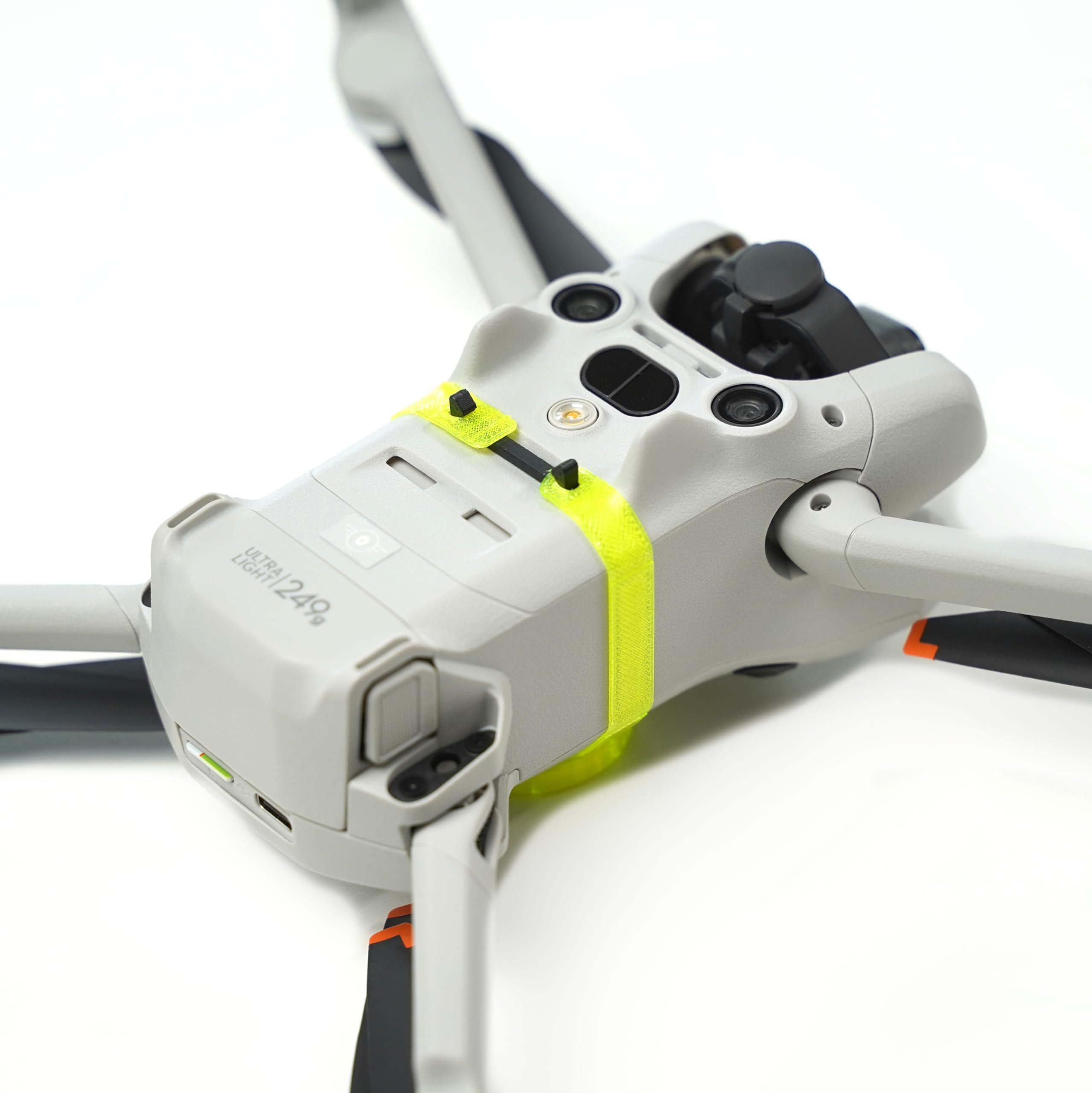 Uchwyt AirTag pasujący do drona DJI Mini 3 i Mini 4 Pro, (mocowanie pasuje do Airtag) (Mini 3 / Mini 4 Series, żółty)