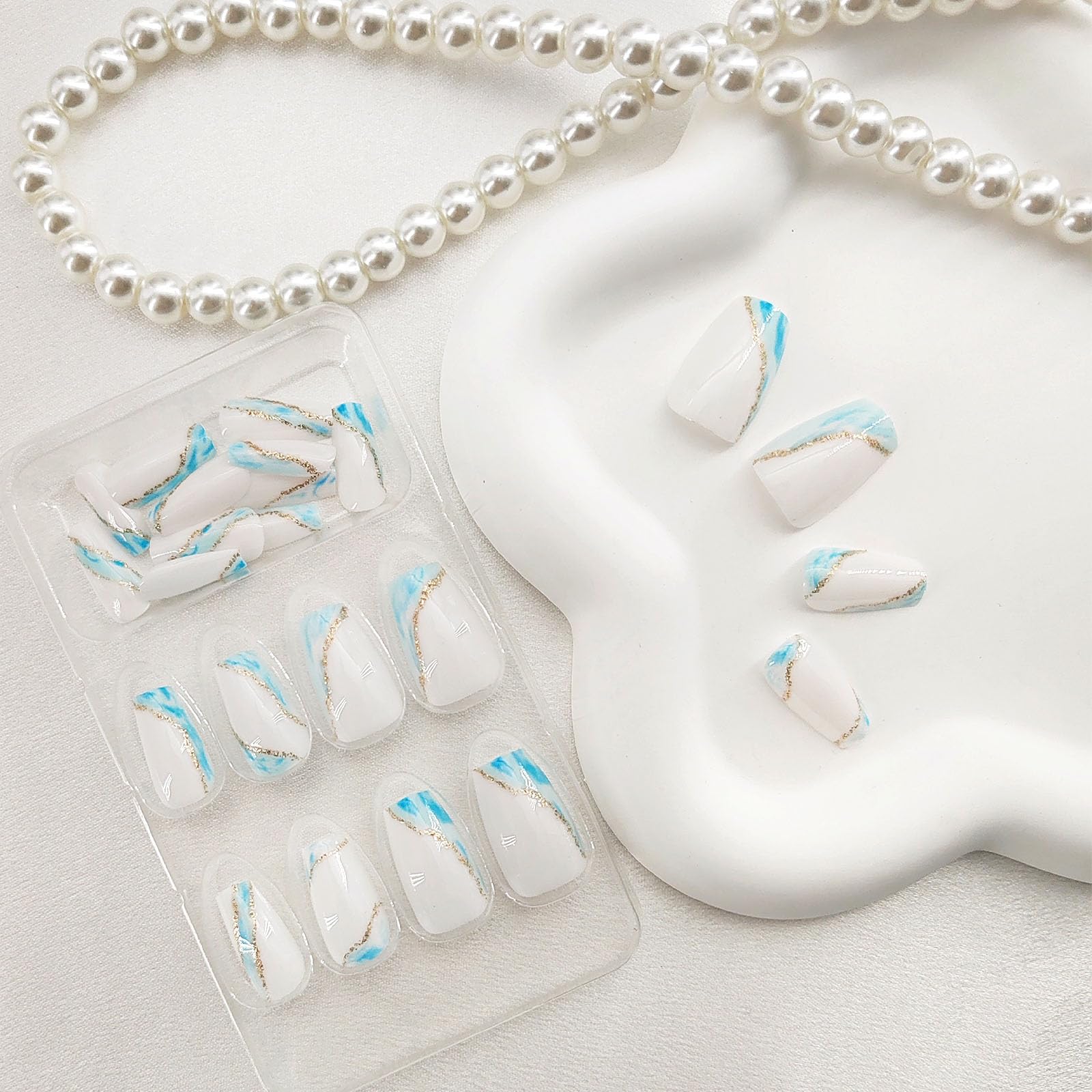 Summer Press on Nails Short Fake Nails with Blue Glitter Designs Coffin Nails Press ons French Tip Glue on Nails Nude Acrylic Nails Spring False Nails Natural Stick on Nails for Women 24Pcs