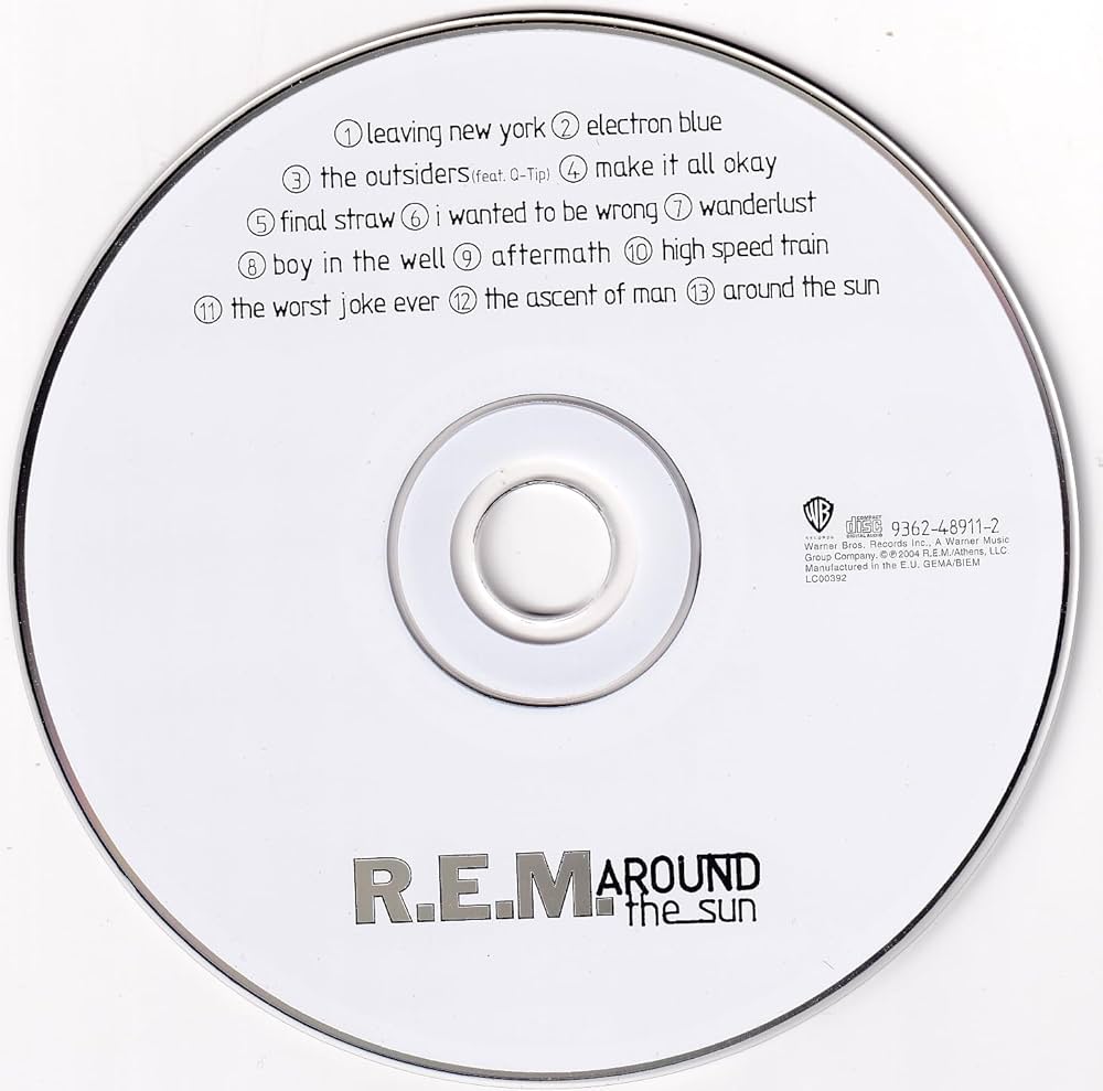 Amazon.com: Around the Sun: 0093624891123: R.E.M.: Books