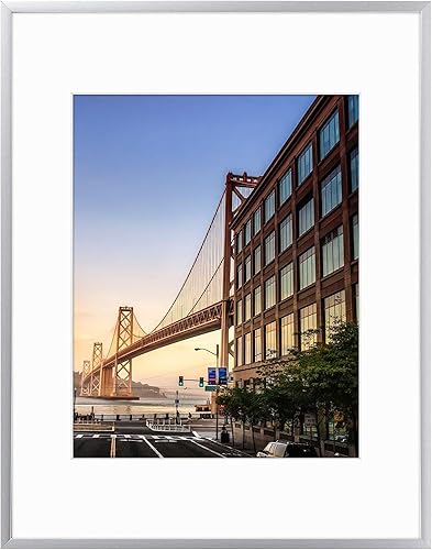 Vista 309 de Frametory - Marco de aluminio de 11 x 14 para fotos de 8 x 10 (en pulgadas), con paspartú marfil, de pared, con gancho de sierra, pestañas Bronce