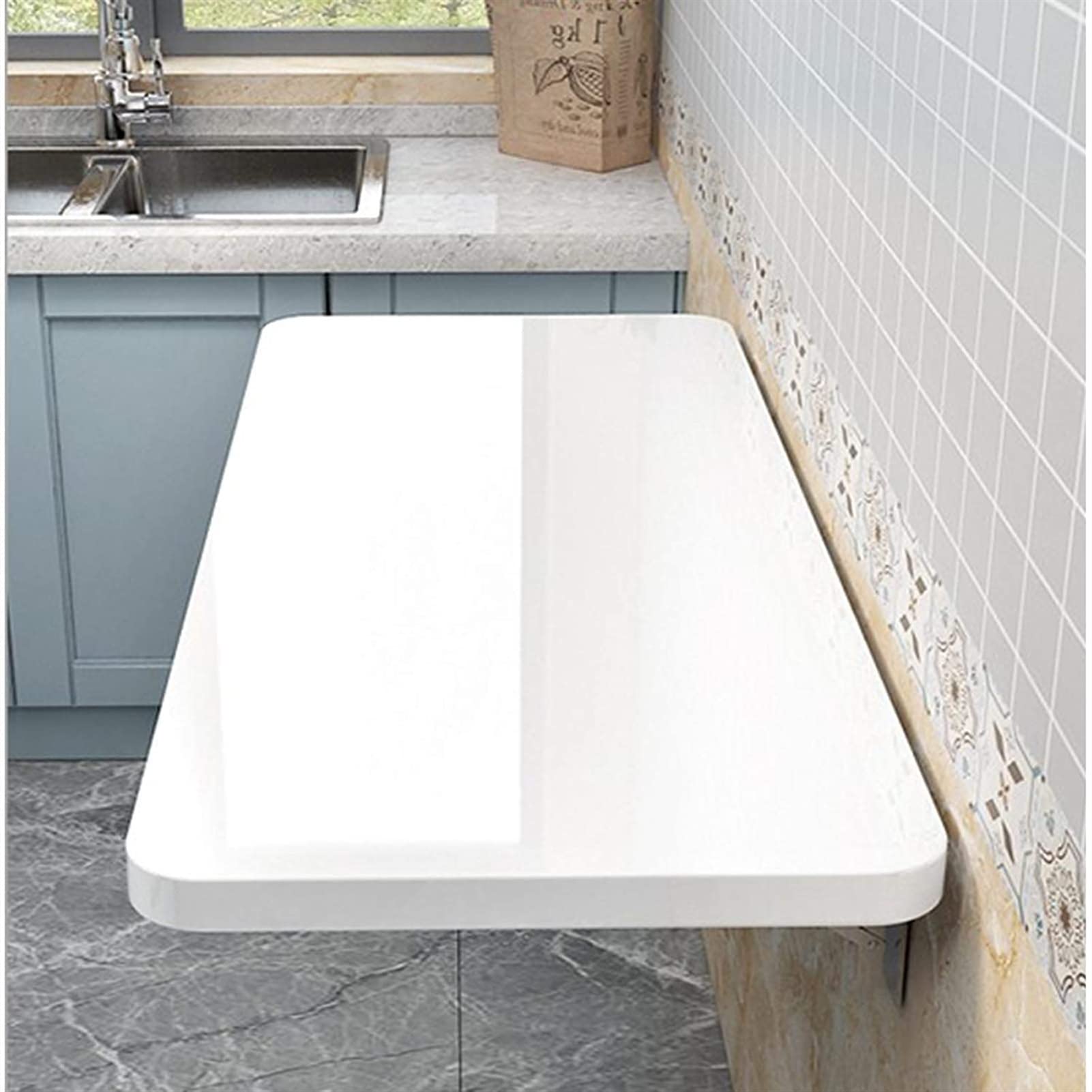 Table pliante multifonctionnelle blanche pour petits studios saturés