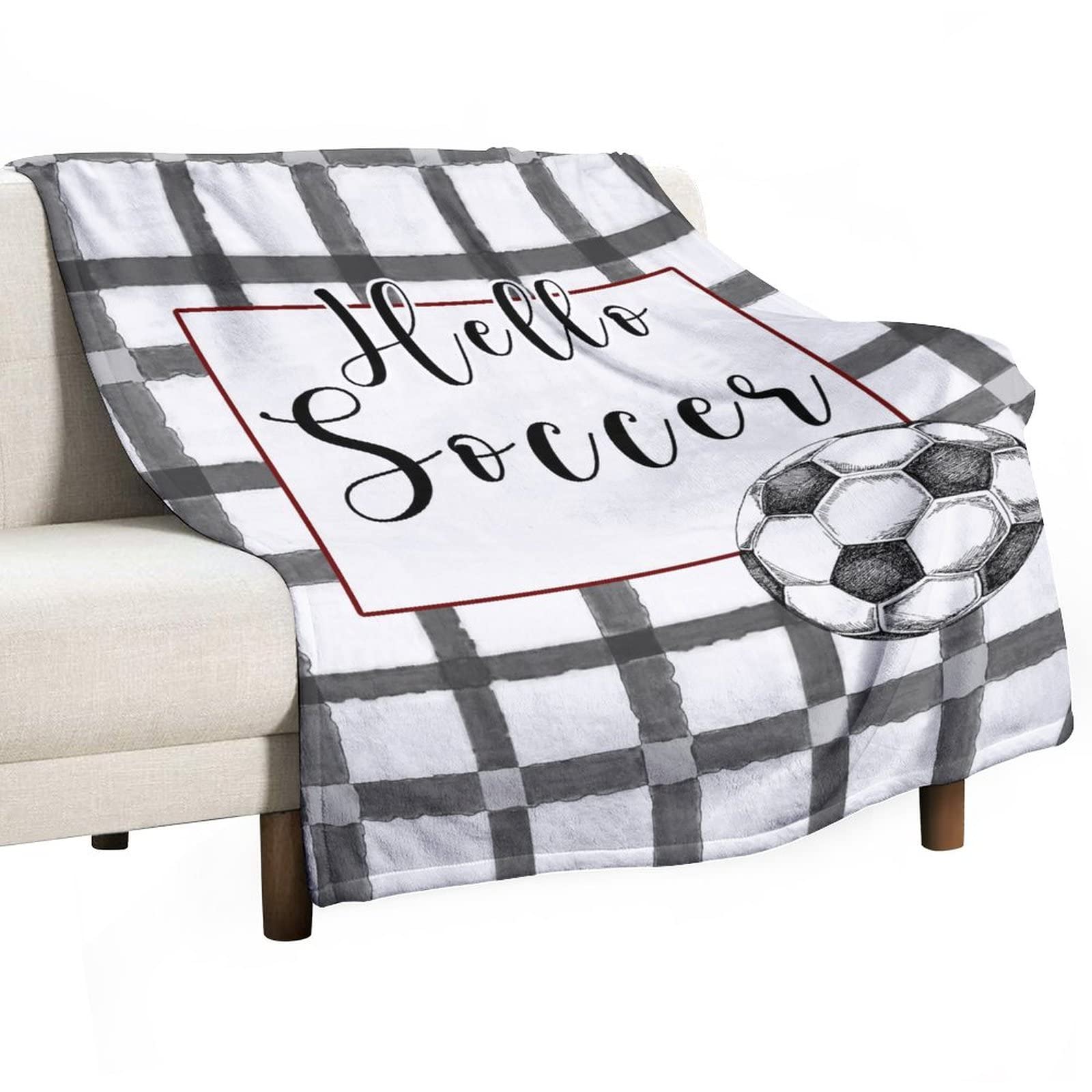 Couverture duveteuse pour soirée match de foot sur le canapé du salon