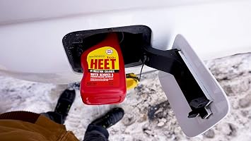 Heet Iso-HEET Water Remover And Premium Fuel Line Antifreeze + Injector Cleaner Helps Increase Gas Mileage Improves Engine Performance Year Round Performance, 12 fl. oz. (28202), Red | Dry gas fuel additive that removes water, helps prevent fuel line freeze-up, and cleans injectors year-round.