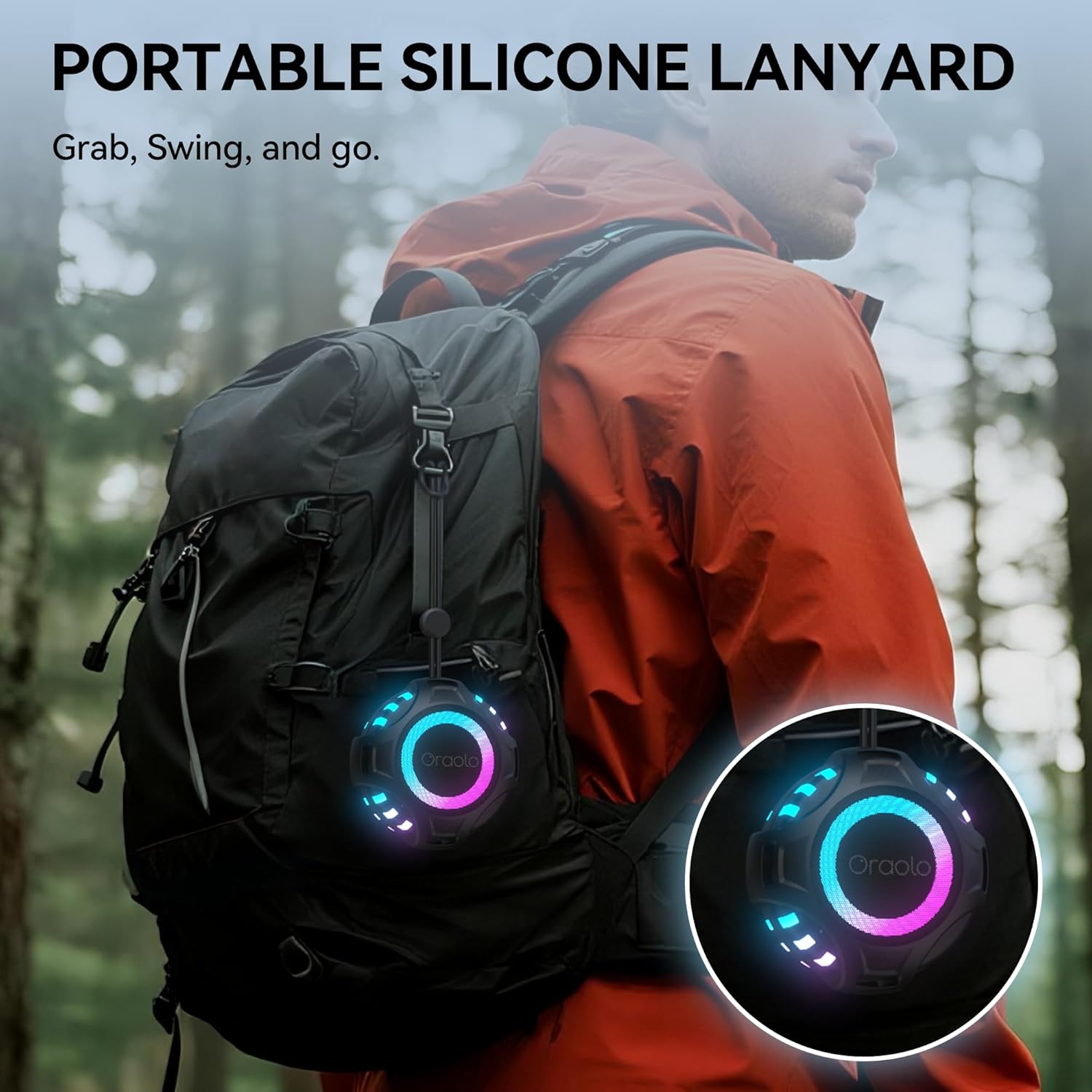 Oraolo BS15 speaker clipped to a backpack with its silicone lanyard, showing its portability.