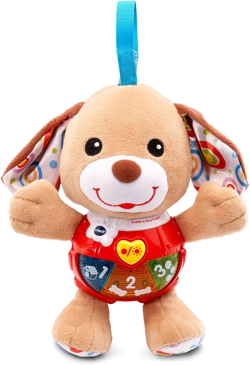 Bebé abraza y canta al cachorro