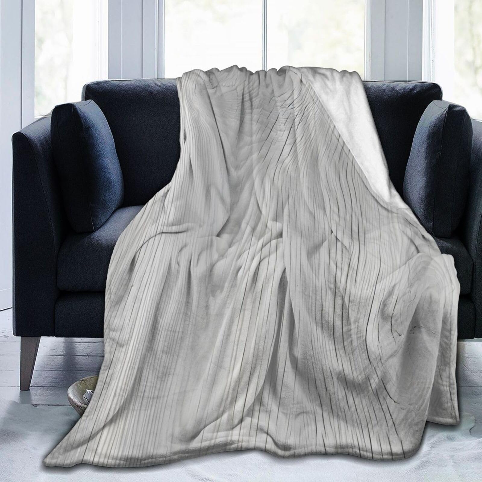 Jeté de canapé Mexpekil en grain de bois gris, l'élégance textile pour sublimer le mobilier