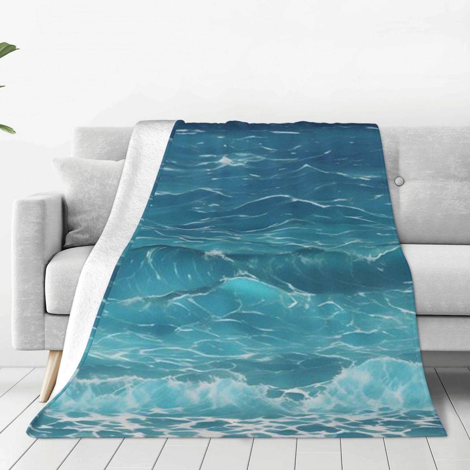 Couverture flanelle océan pour cocooning sur le canapé