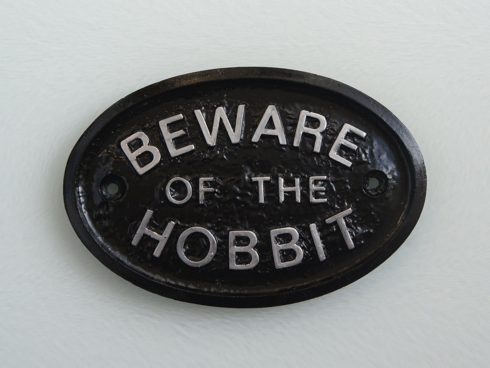 Home Works Black And Silver Silver Beware Of The Hobbit Wall Plaque In Black With Raised Silver Lettering