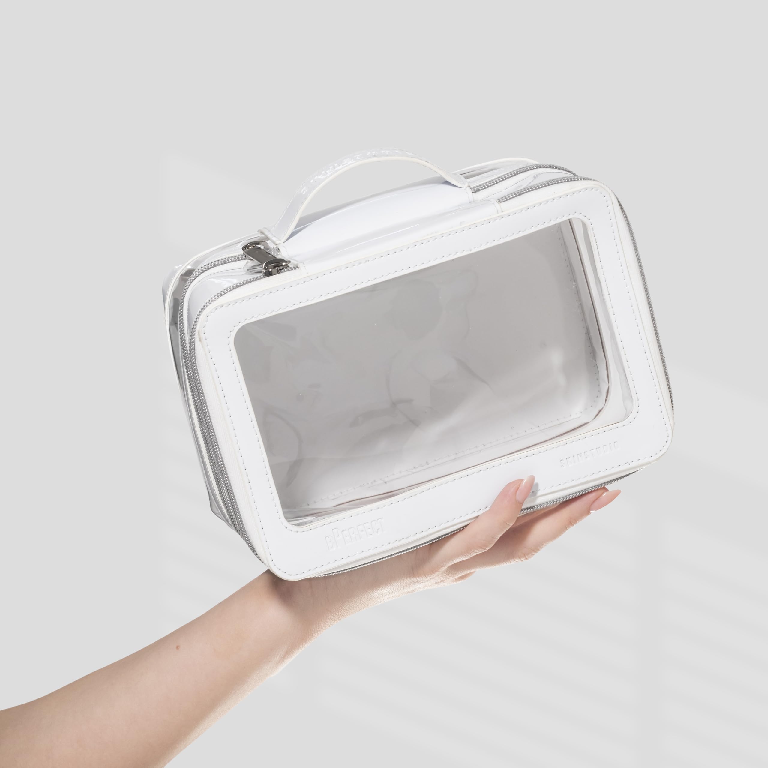 BPerfect Skin Studio Double-Layered Travel Bag, Sleek White PU Leather Cosmetic Case with Transparent Windows - Image 2