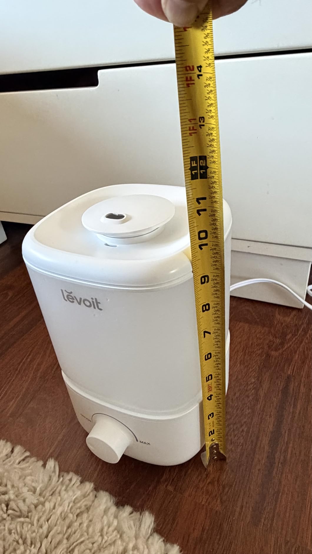 Levoit humidifier height shown, about 10 inches tall