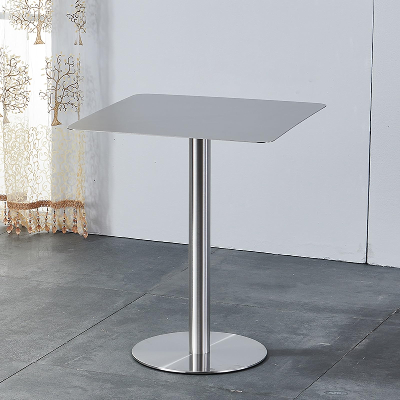 Table de salle à manger moderne en acier inoxydable Slish au design architectural épuré