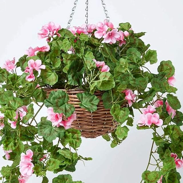 HOMESCAPES Light Pink Geranium Artificial Hanging Basket Medium Lifelike Hanging Plant For Indoor and Outdoor Decoration Trailing Flowers In Brown Wicker Pot with Metal Chain and Hook 80 cm Long