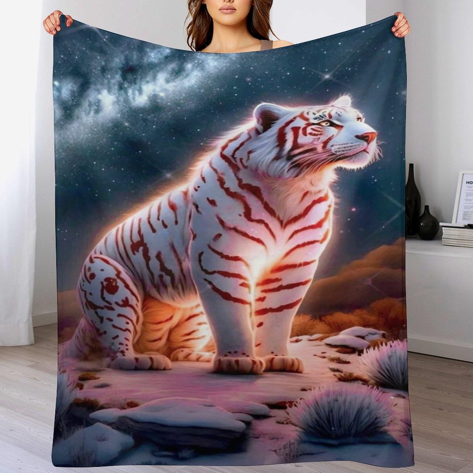 Couverture tigre douce sur le balcon pour des soirées cocooning