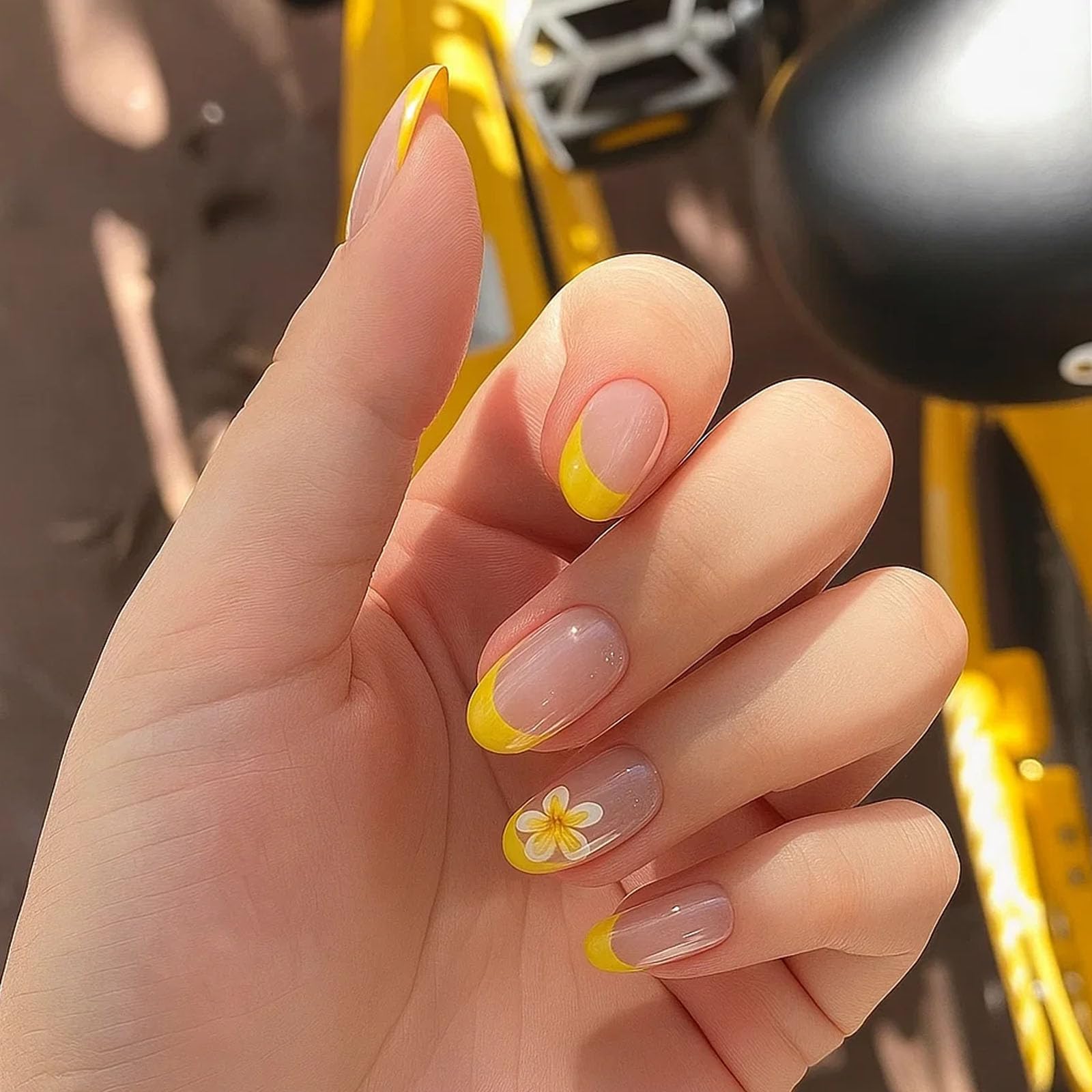 Short Almond Press-On Nails with Yellow French Tip & Daisy Accent