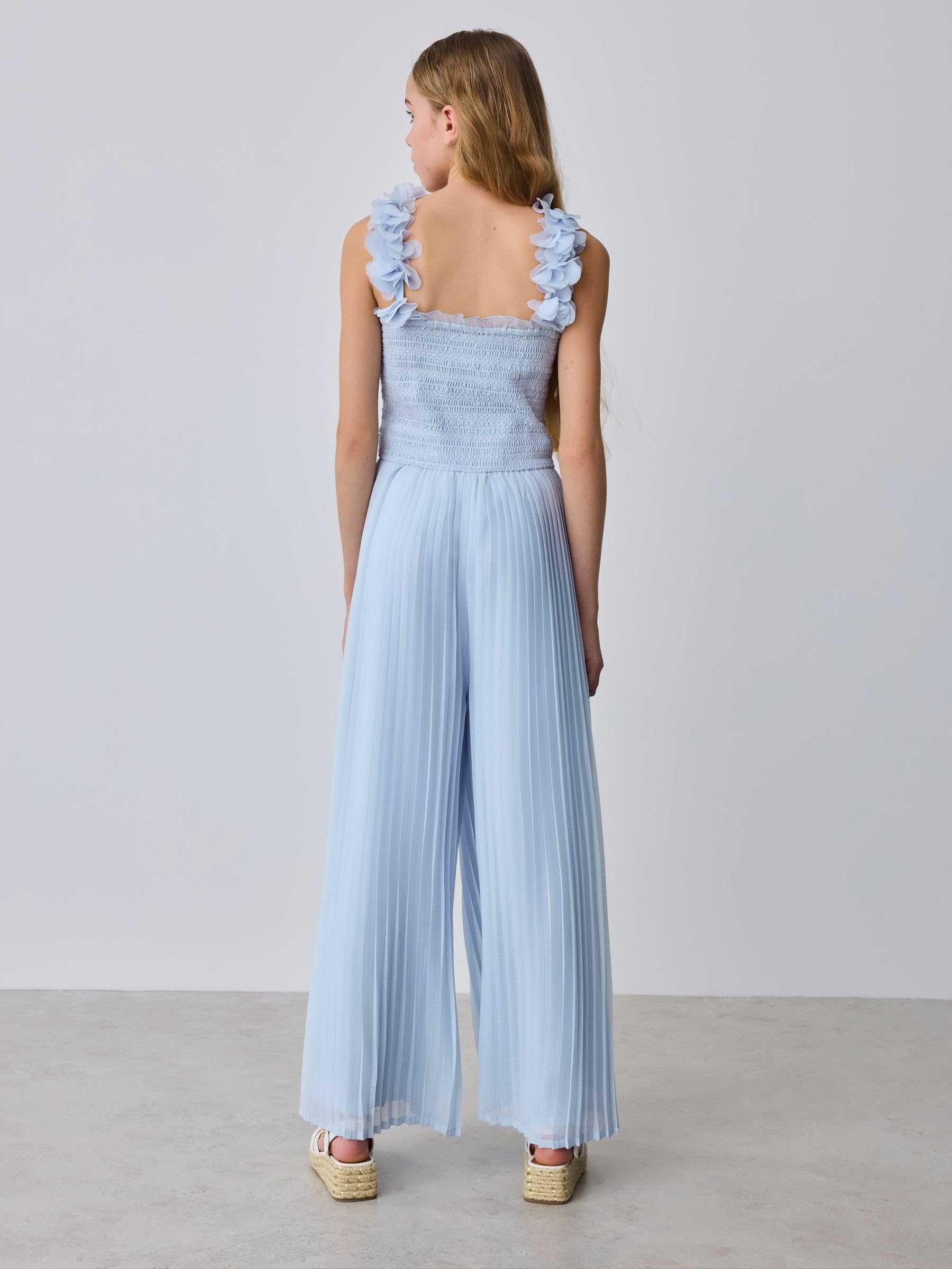 Mädchen Träger-Jumpsuit mit plastischen Blumen, Falten und weitem Bein