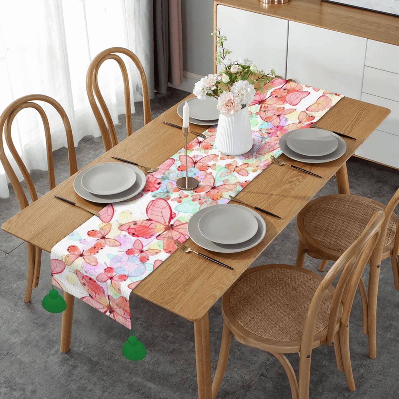 Nappe pour cuisine et chemin de table lin papillon rose contre les tables ternes