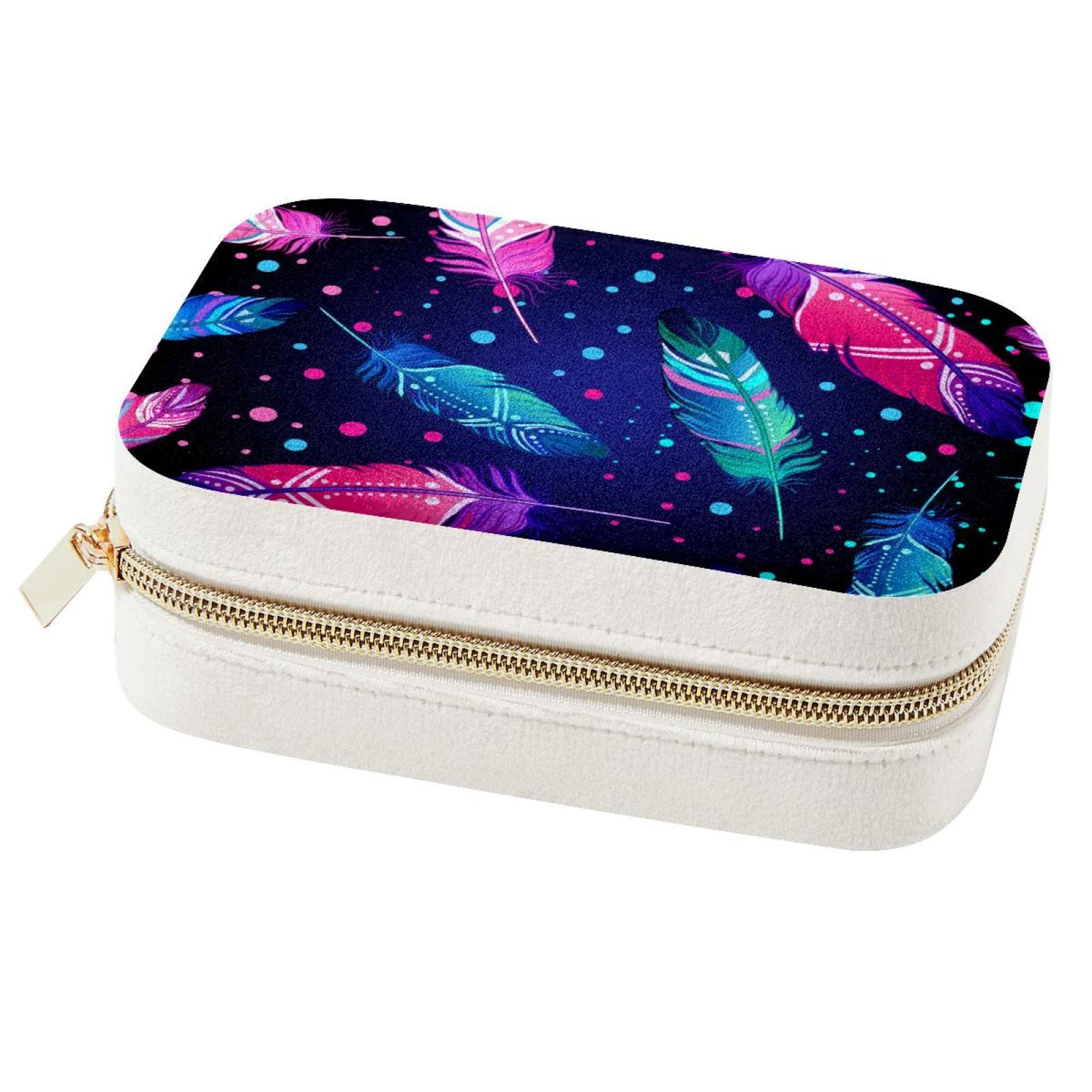 Boîte à bijoux de voyage plume idéale pour organiser vos bagues en vacances