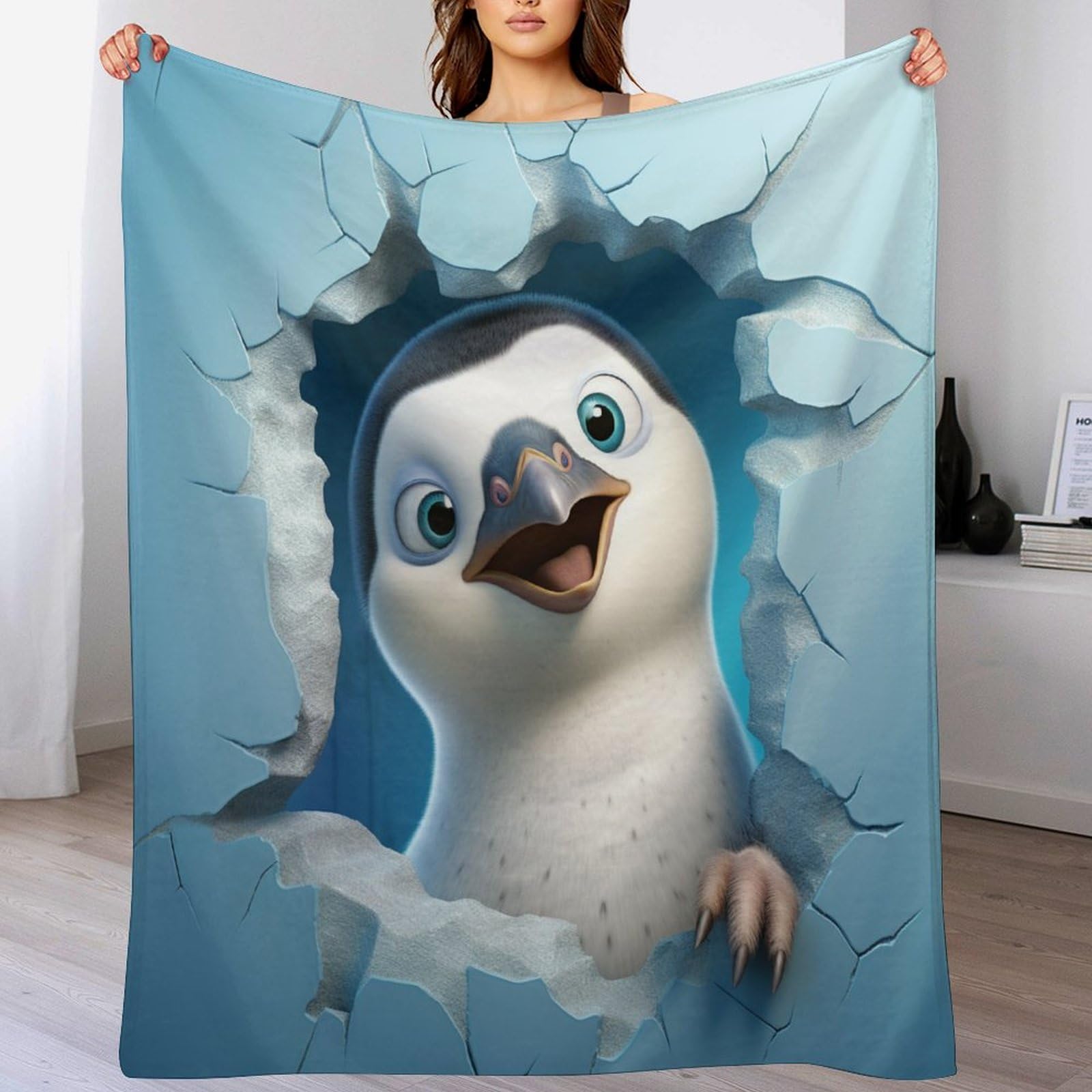 Couverture polaire pingouin pour vos soirées cocooning sur le canapé