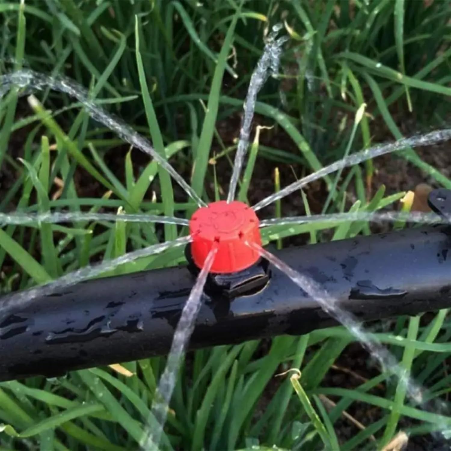 50-500 個調節可能な灌漑ドリッパースプリンクラー 1/4 ''エミッタドリッパーマイクロ点滴灌漑スプリンクラー